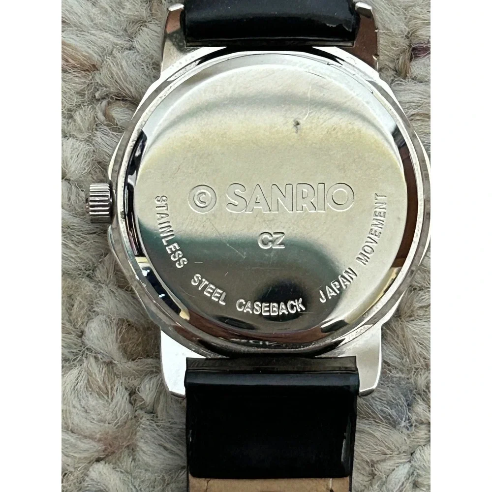 Hello Kitty Women's Watch Silver Tone Rhinestone Bezel‎ Black Band